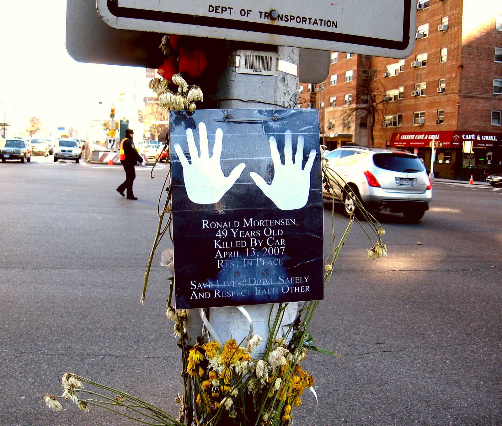 Plans to improve safety on Tillary Street have been in the works since 20004. Above: A sign was temporarily installed to honor the memory of teacher Ron Mortensen, run down by a car on Tillary and Adams Streets at the entrance to the Brooklyn Bridge in 2007. Mortensen tripped over his own shoes trying to run out of the way of a car. Photo by MK Frost, courtesy of McBrooklyn