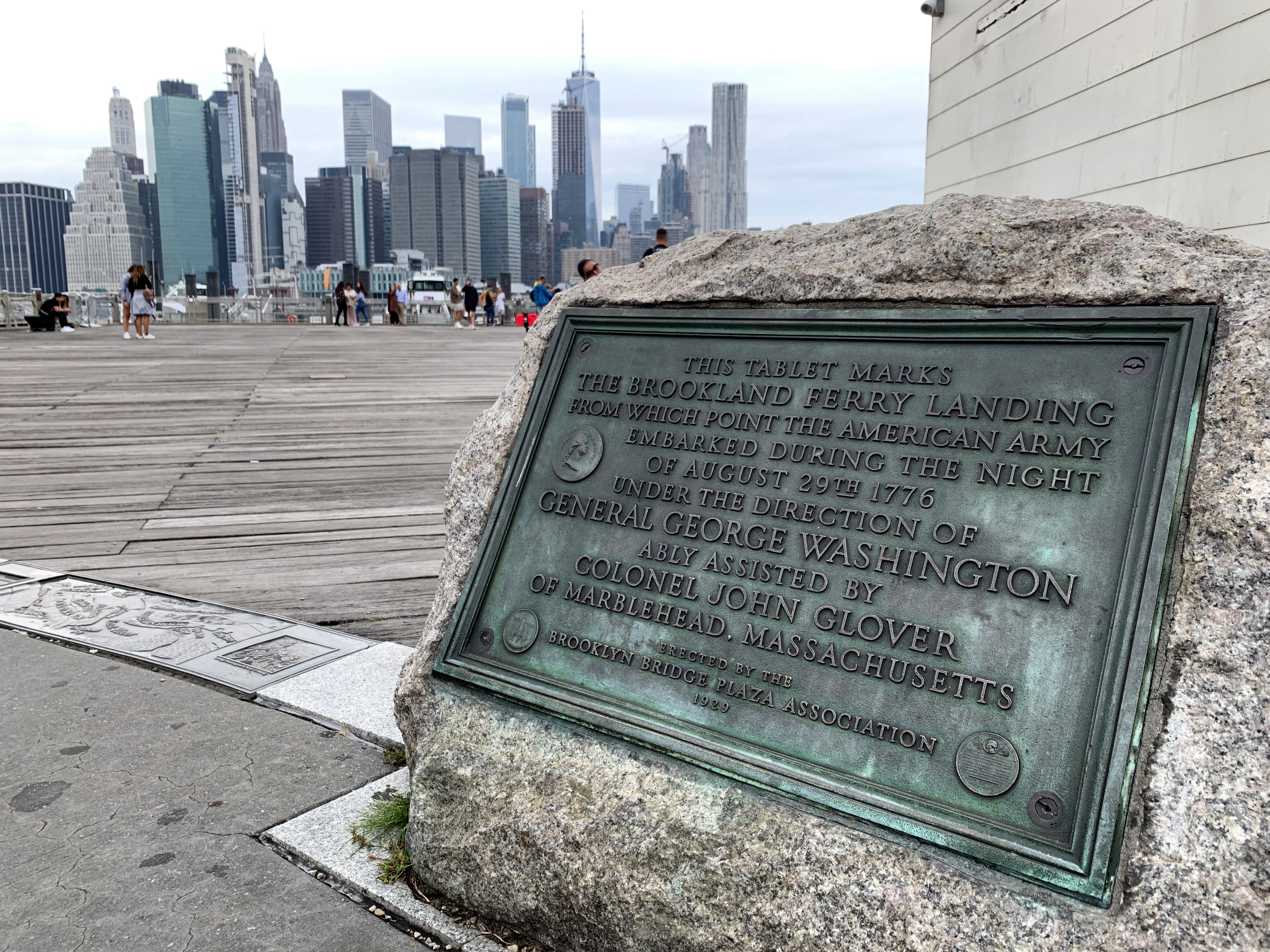 This plaque at Fulton Ferry Landing, now part of Brooklyn Bridge Park, marks the spot where the American army embarked during the night of August 29, 1776 under the direction of Gen. George Washington to escape from the British, leaving the troops intact to fight again another day. Eagle photo by Mary Frost