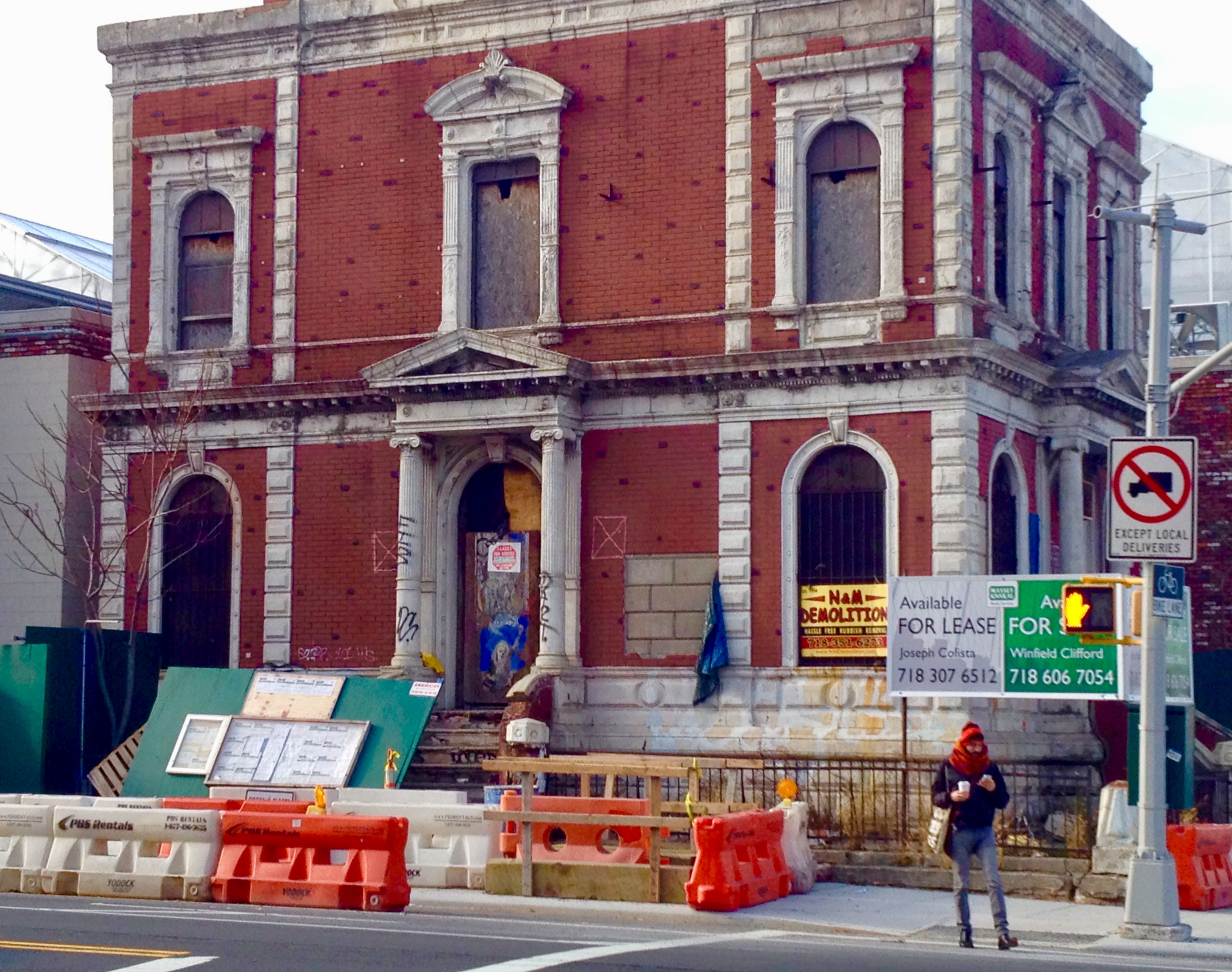 The Coignet Building’s facade is covered with faux brick in this December 2013 photo. Eagle file photo by Lore Croghan