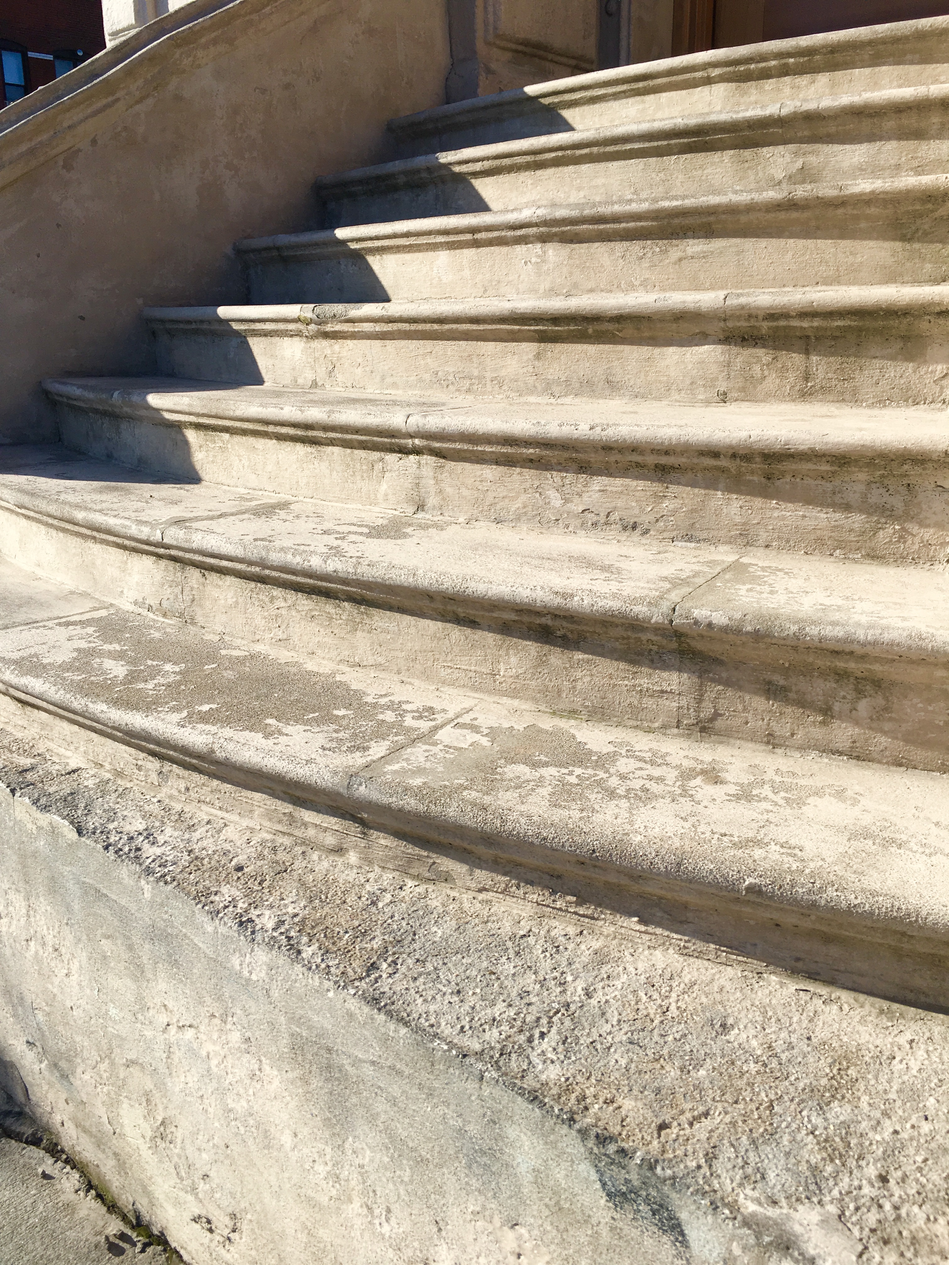 This Aug. 29 photo shows where the finish has worn off a set of entrance stairs at the Coignet Building. Eagle photo by Lore Croghan