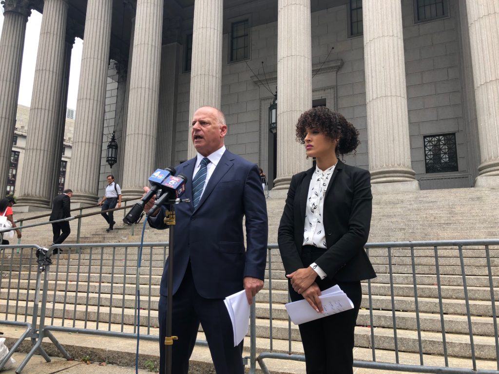 Jeff Herman, left, and Krisel McSweeney, right, of Herman Law on steps of New York County Supreme Court Wednesday afternoon. Photo by Emma Whitford