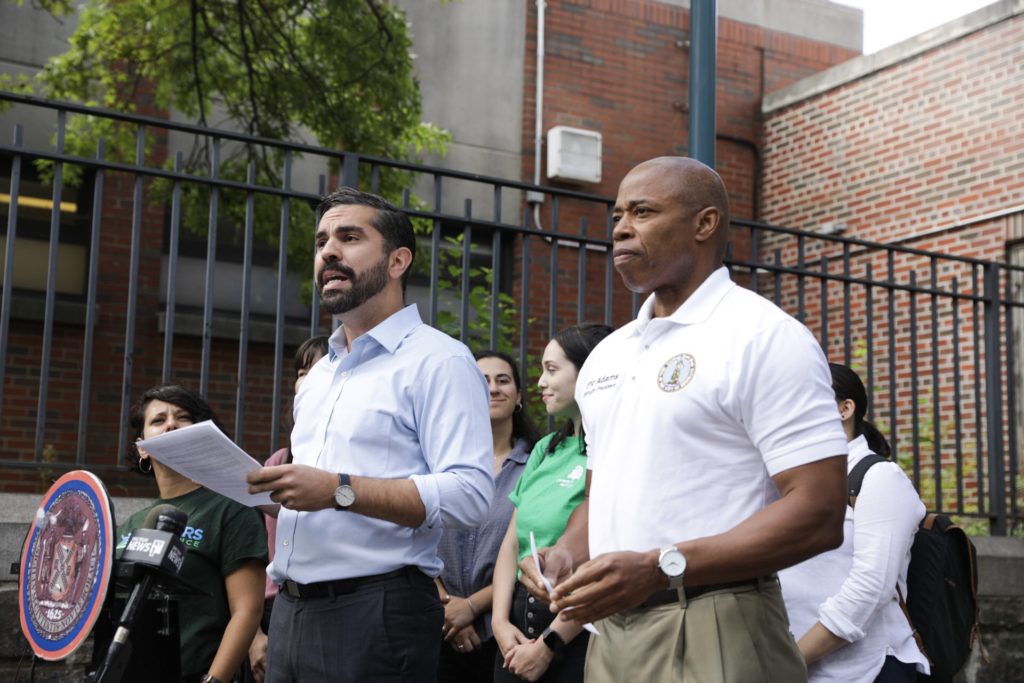 Councilmember Rafael Espinal, left, and Brooklyn Borough President Eric Adams, right, called on the MTA to fund needed improvements to Broadway Junction. Eagle photo by Paul Frangipane