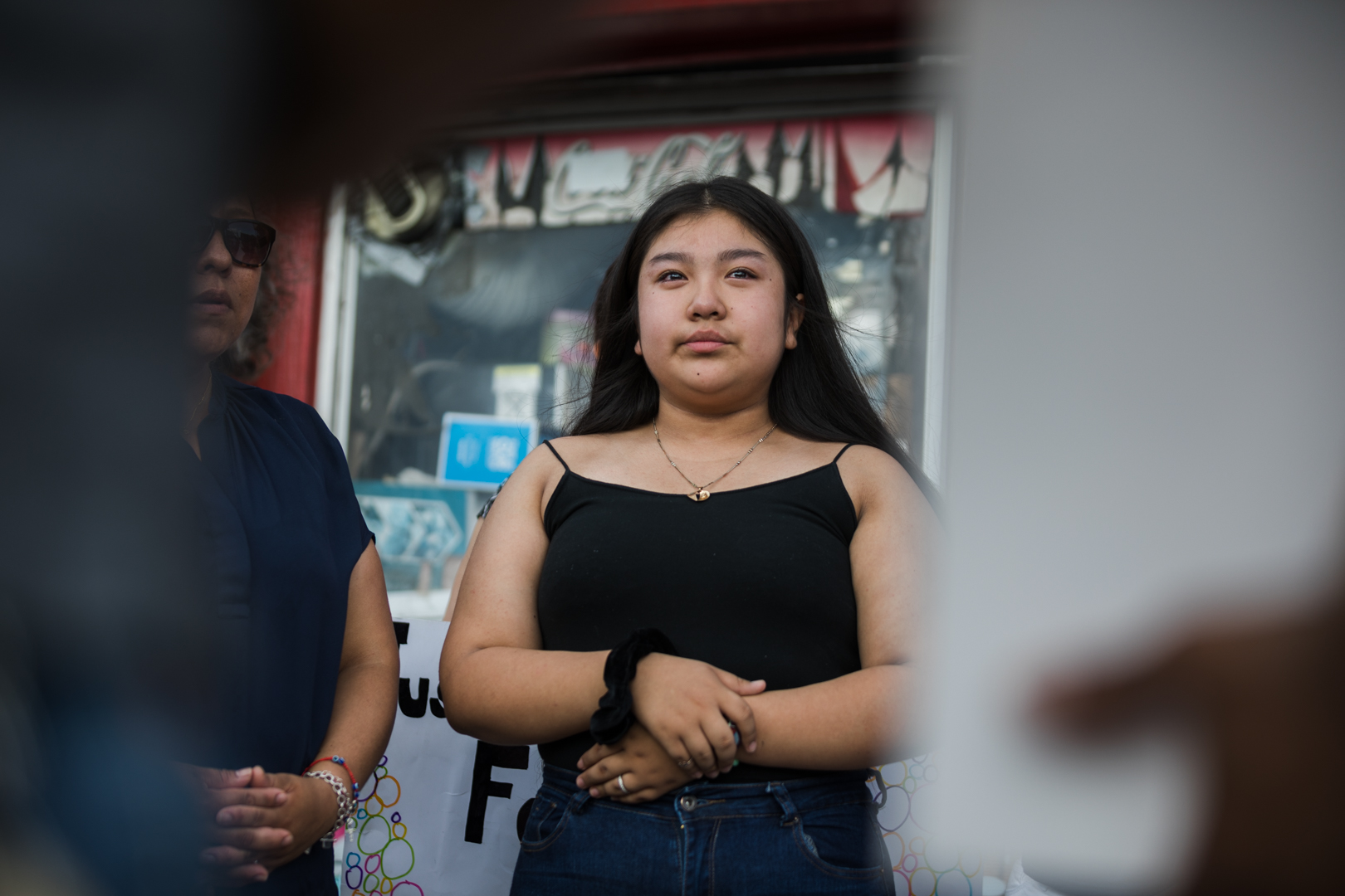Ana Karen Porras, 13, at a memorial for her mother María del Carmen Porras Hernández, who was fatally struck by a car on July 8. Eagle photo by Paul Frangipane