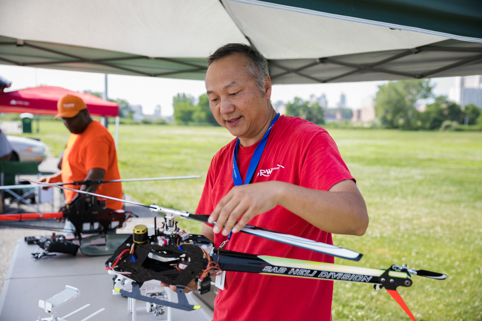 David Yuen, president of Seaview Rotary Wings, inspects his machine. Eagle photo by Paul Frangipane