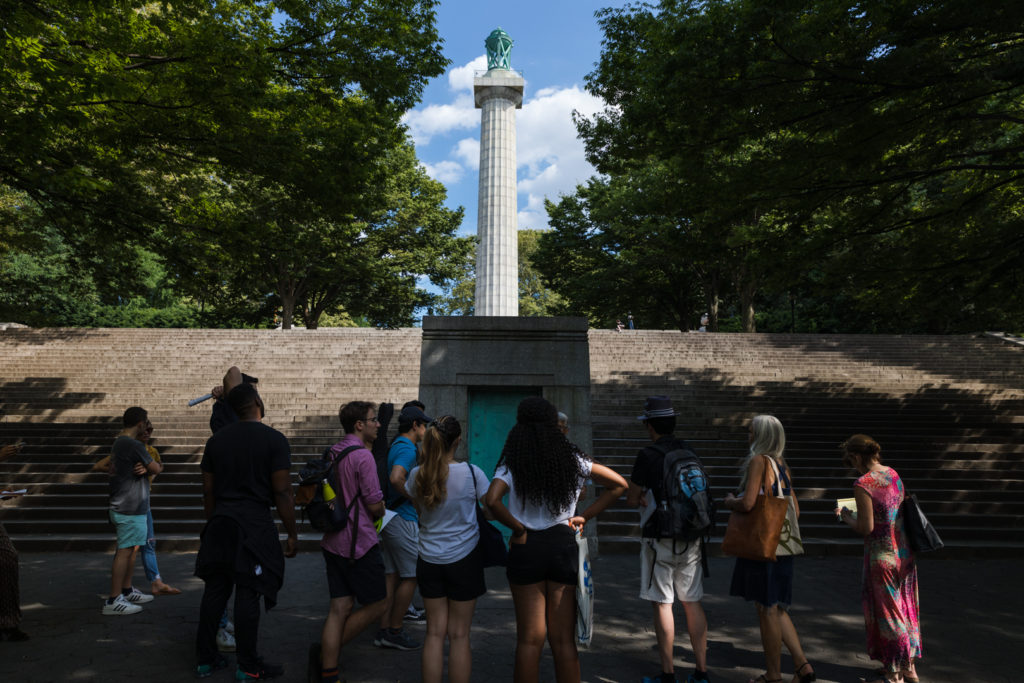 Professor Karen Karbiener and her students stand in front of the prison ship martyrs’ crypt in Fort Greene Park. Eagle photo by Paul Frangipane