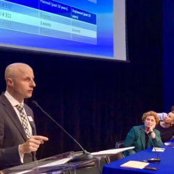 MTA President Andy Byford presents options for replacing the elevators at the Clark Street Subway station, at a town hall Monday night. In the background are Assemblymember Jo Anne Simon, U.S. Rep. Nydia Velazquez and Councilmember Stephen Levin. eagle photo by Mary Frost
