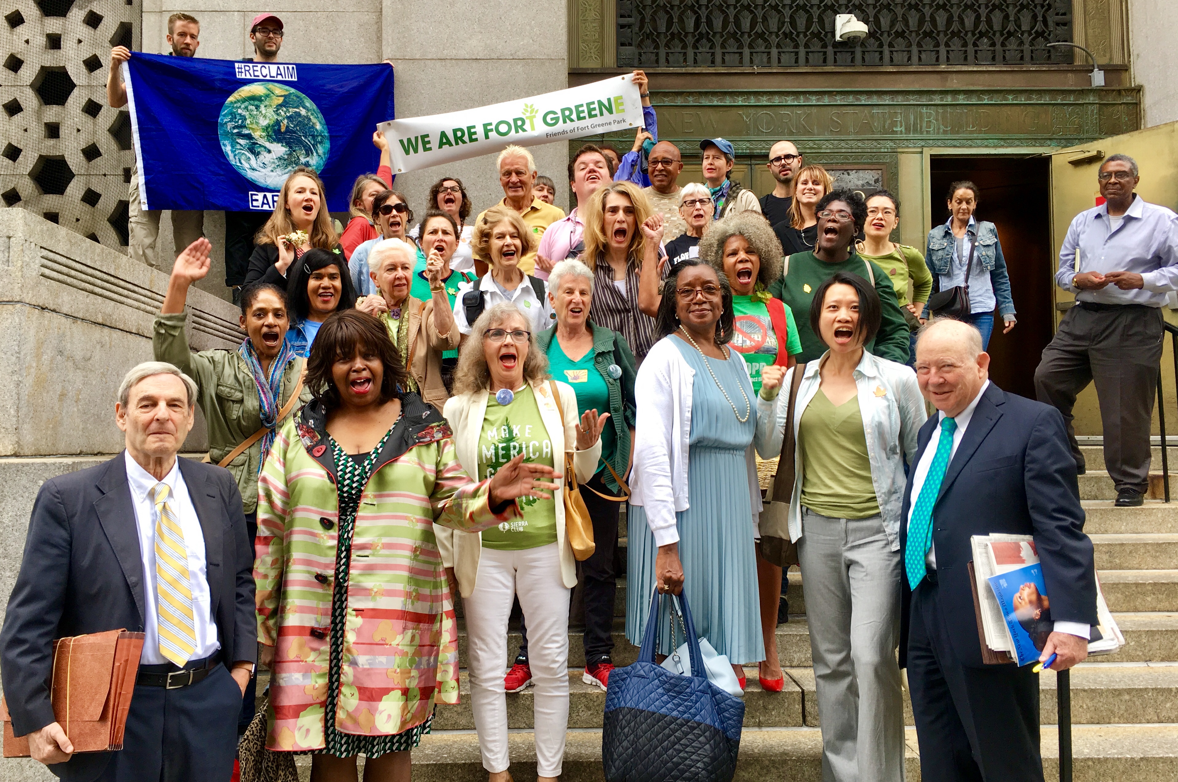 Brooklyn residents chant “Save our trees” on the steps of New York Supreme Court. Eagle photo by Lore Croghan