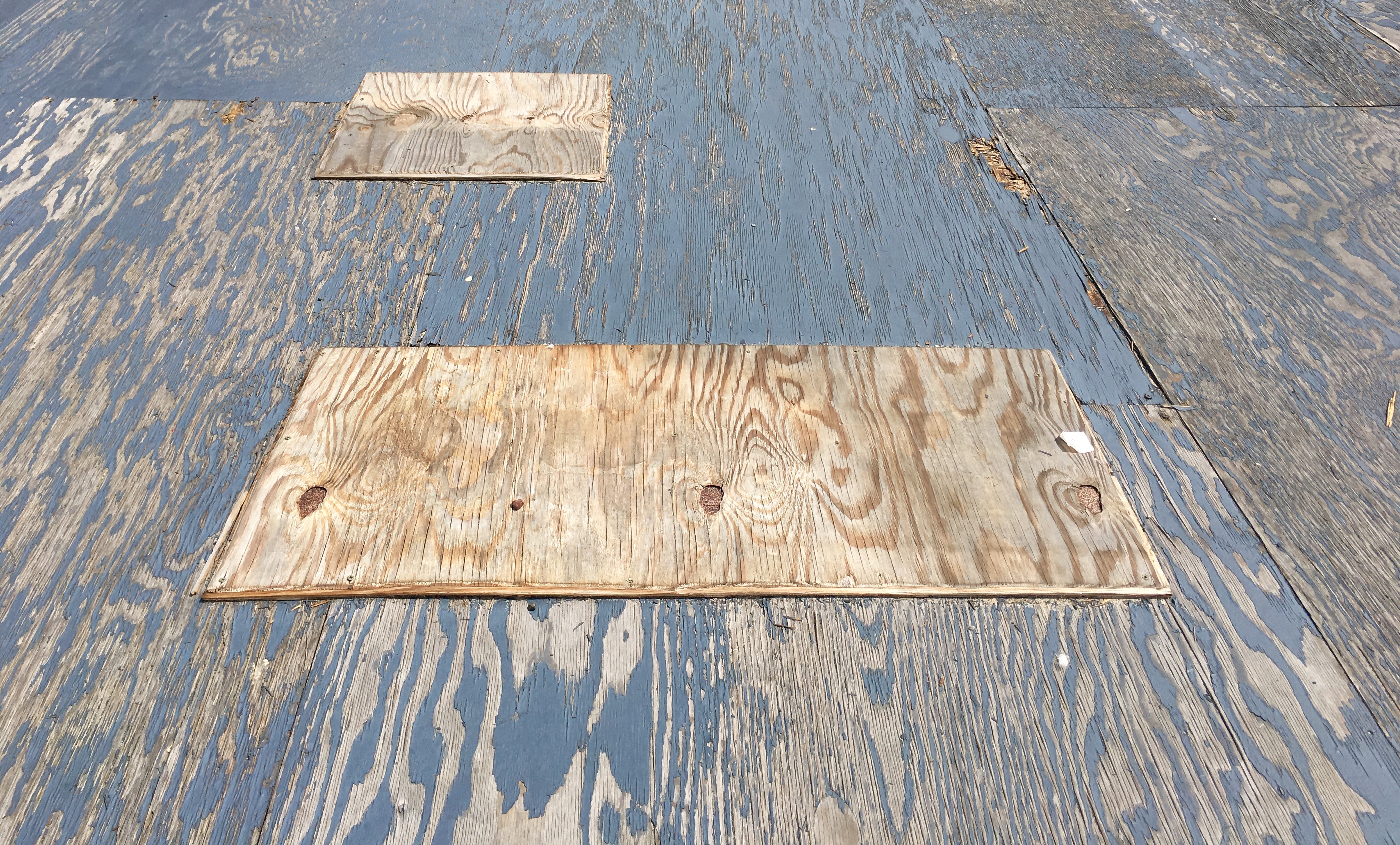 Be careful where you walk on the Coney Island Boardwalk’s patched-up plywood deck. Eagle photo by Lore Croghan