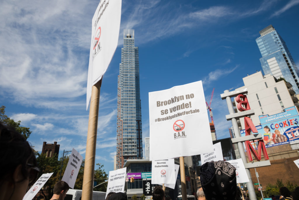 Protesters begin their march in Downtown Brooklyn, an area that has seen rapid development of luxury high-rises and office buildings since a 2004 rezoning. Eagle photo by Paul Frangipane