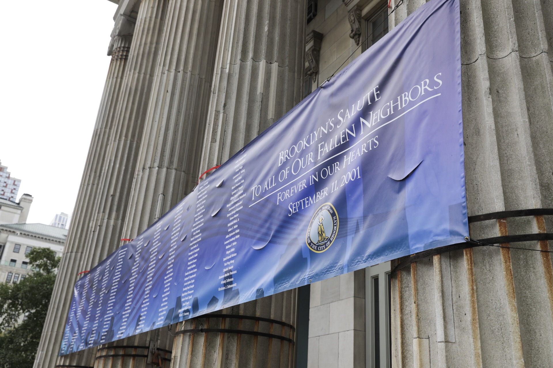 A banner outside Borough Hall lists the names of all 266 Brooklyn residents who perished in the Sept. 11, 2001 attacks. Eagle photo by Paul Frangipane