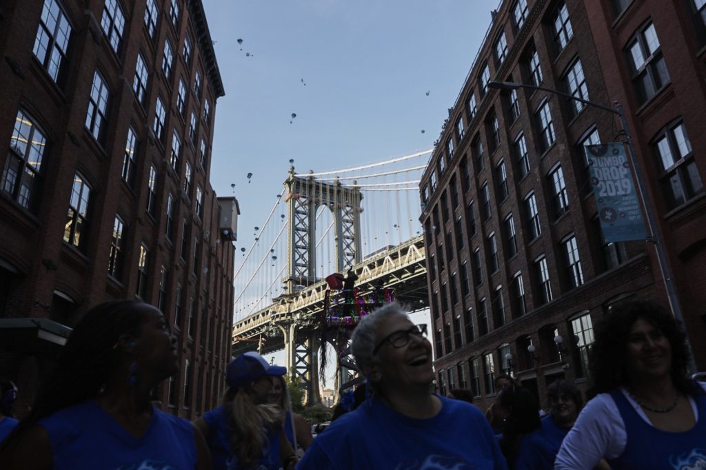 Roughly 2,500 toy elephants were dropped from rooftops onto Washington Street in DUMBO for the third annual DUMBO Drop. Eagle photo by Paul Frangipane
