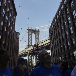 Roughly 2,500 toy elephants were dropped from rooftops onto Washington Street in DUMBO for the third annual DUMBO Drop. Eagle photo by Paul Frangipane