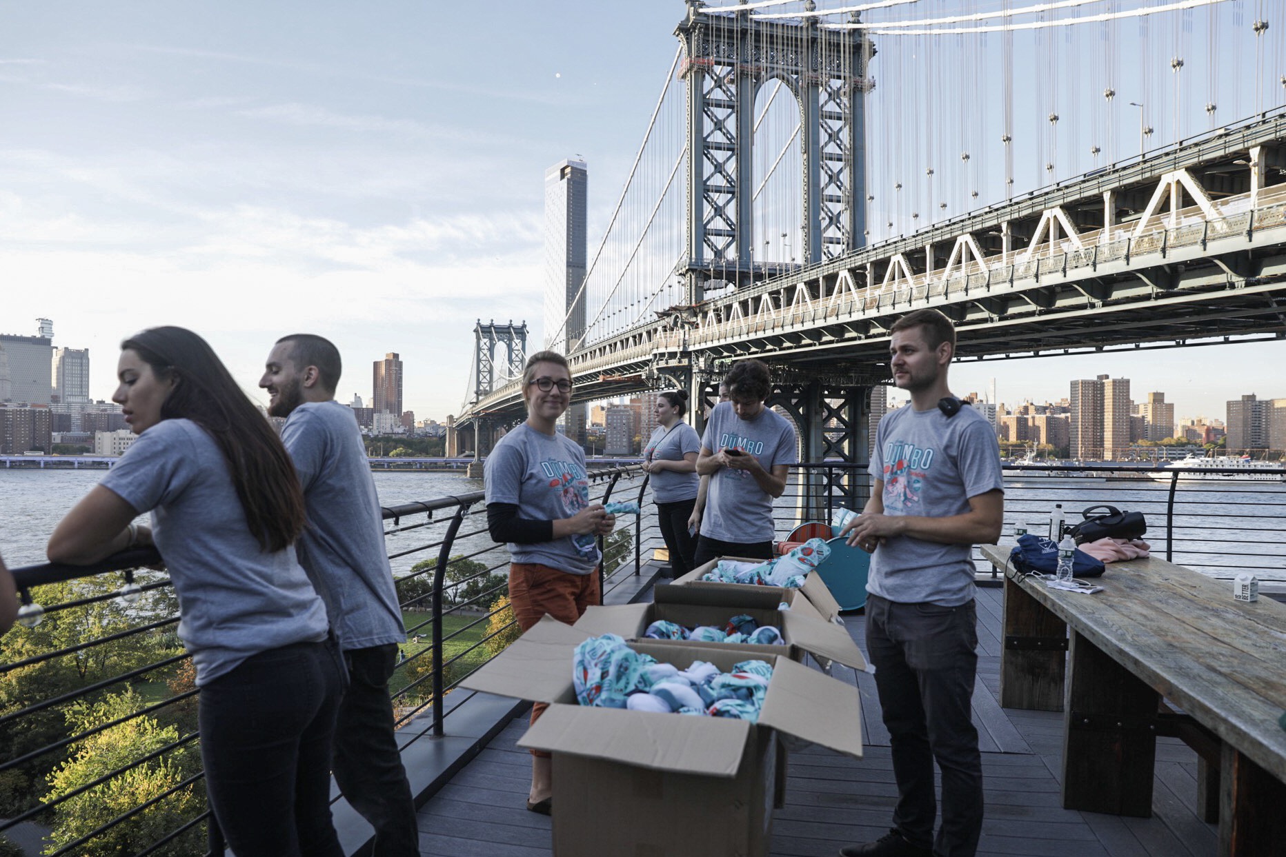 The DUMBO team waits for the first drop atop a nearby rooftop. 