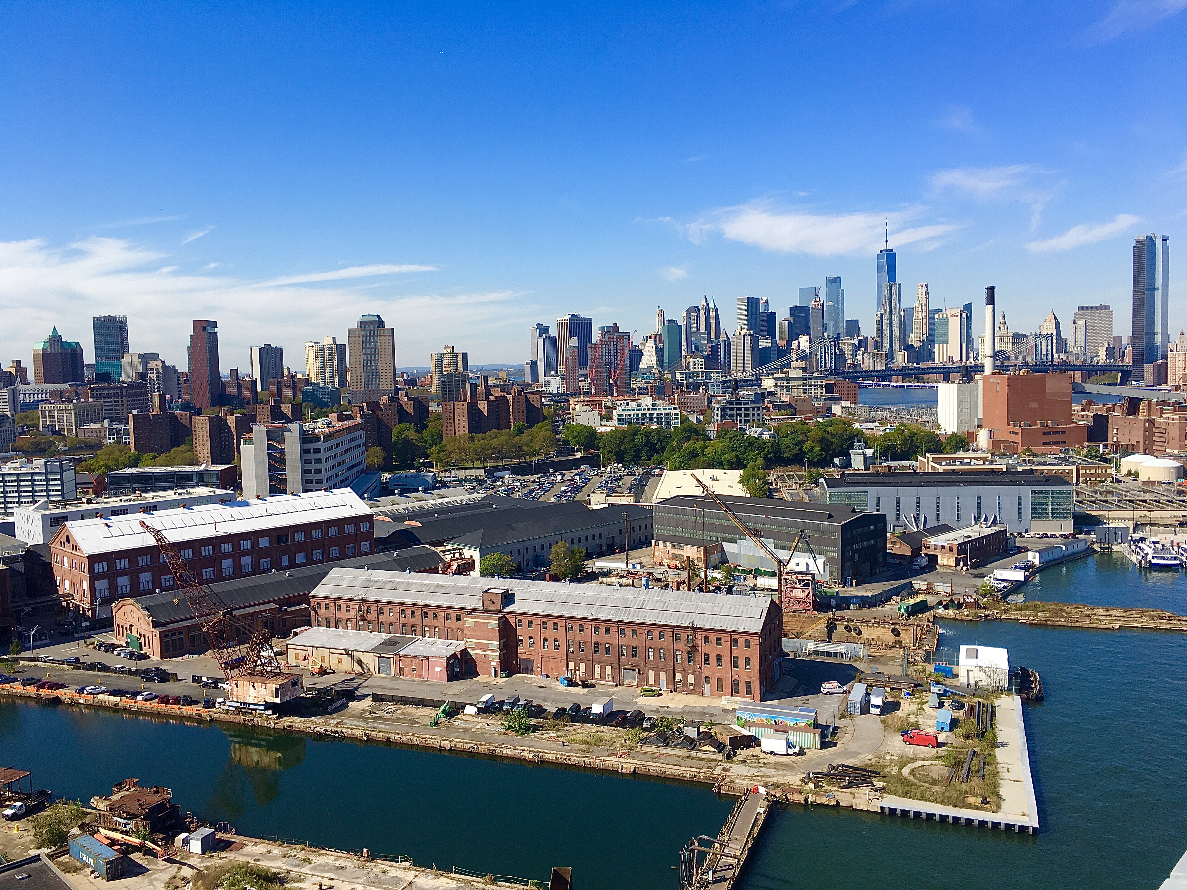 Dock 72’s got quite a view of historic Brooklyn Navy Yard buildings down below and the World Trade Center on the horizon. Eagle photo by Lore Croghan