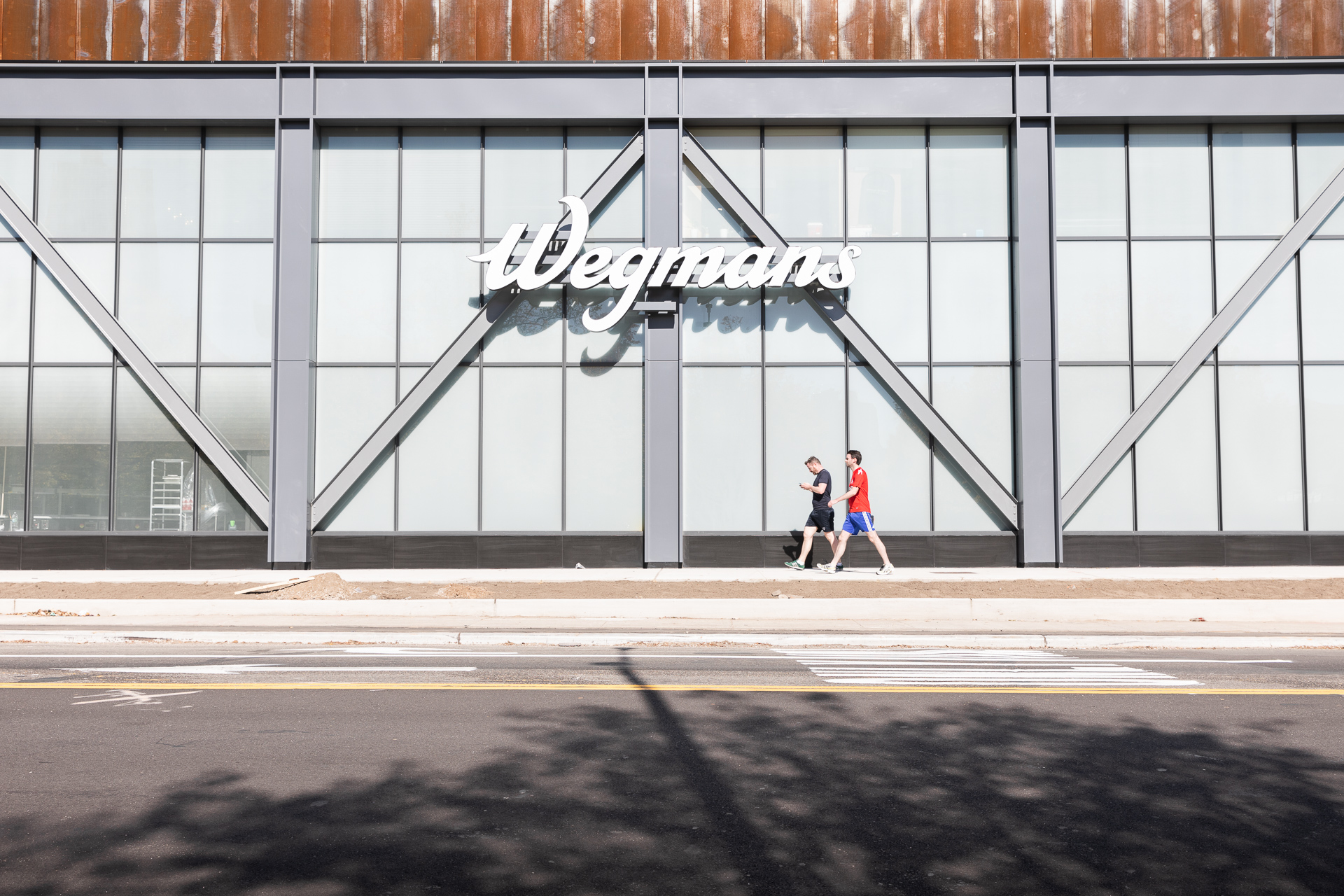 The Wegmans name looms large on the new store’s Flushing Avenue facade. Eagle photo by Paul Frangipane