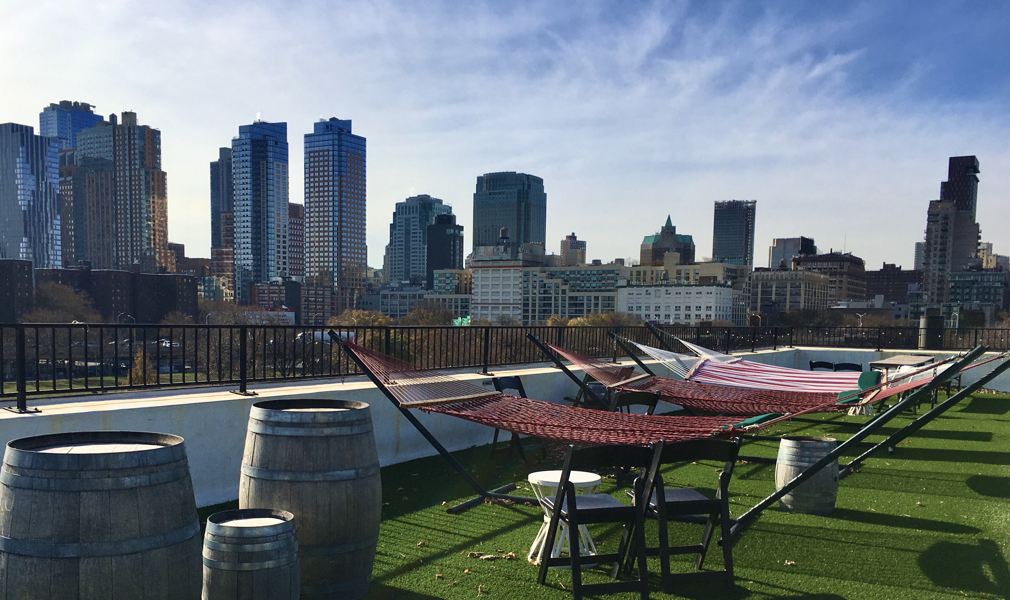 Downtown Brooklyn’s skyline looks pretty great from Rooftop Reds, which is an urban vineyard in the Brooklyn Navy Yard. Photo: Lore Croghan/Brooklyn Eagle