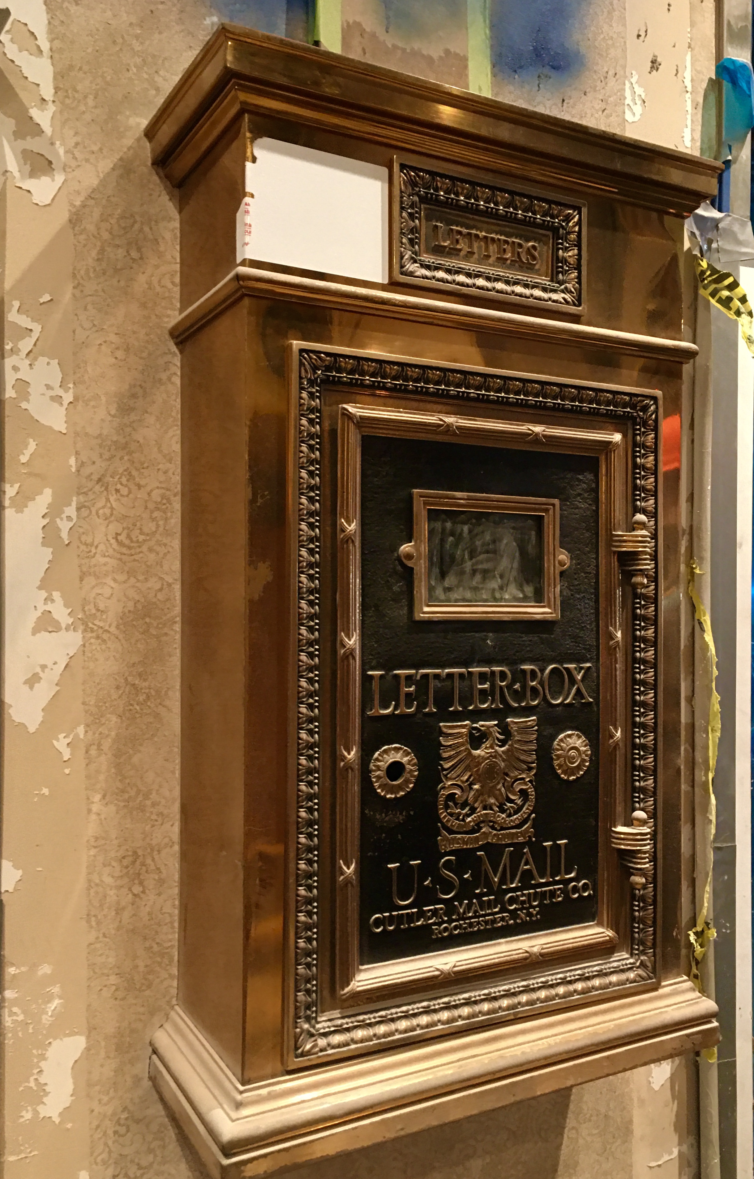 Workers have restored a mailbox in The Watermark at Brooklyn Heights’ lobby. Eagle photo by Lore Croghan