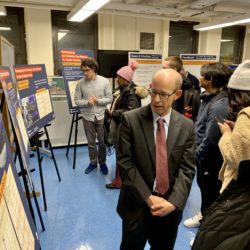 MTA officials explain different bus route redesign ideas at a workshop for riders Wednesday night. Eagle photo by Mary Frost