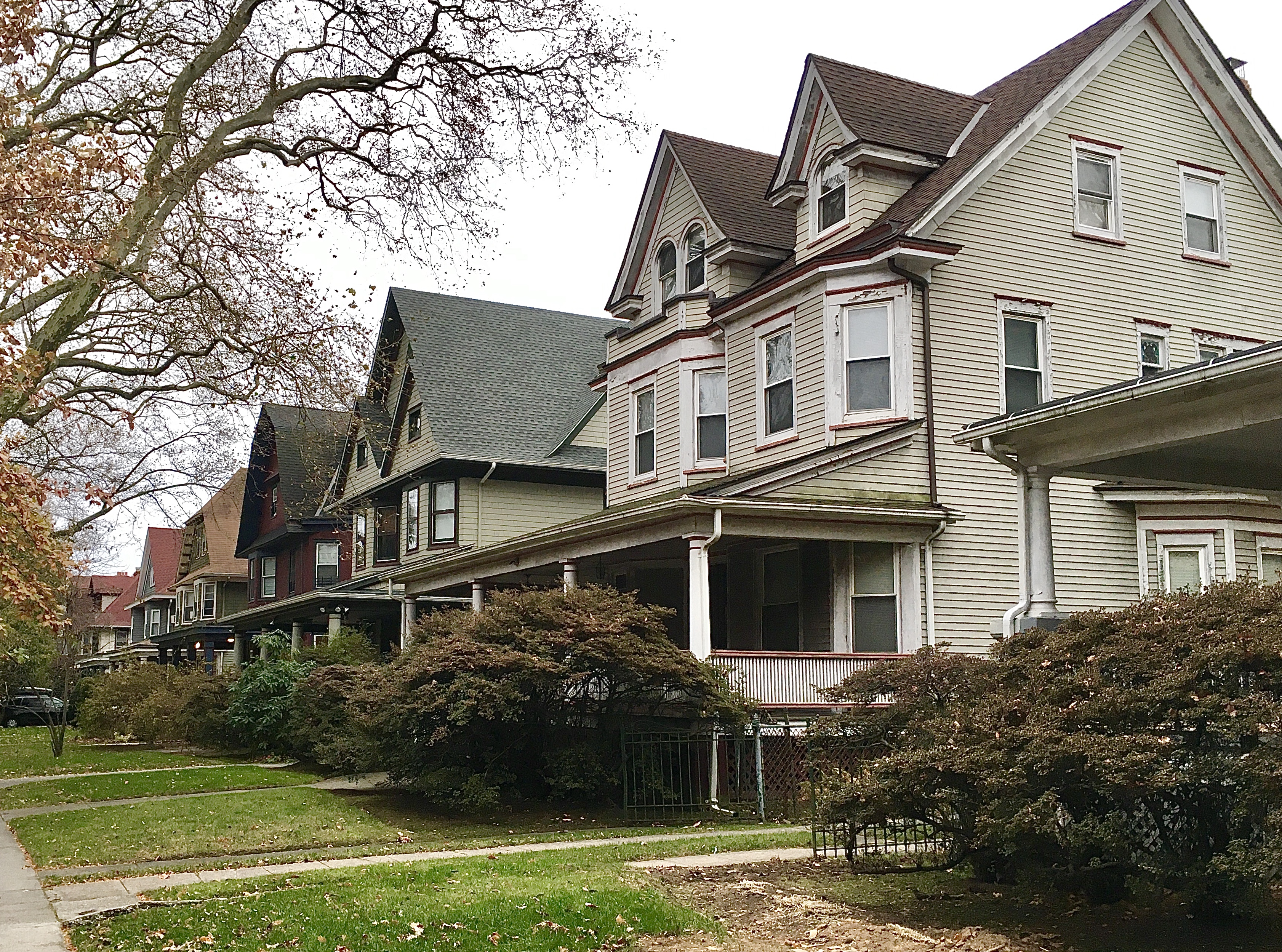 This row of landmarked Midwood Park homes includes 664 East 18th St. (at right), which was designed by architect Benjamin Driesler and constructed around 1904. Photo: Lore Croghan/Brooklyn Eagle