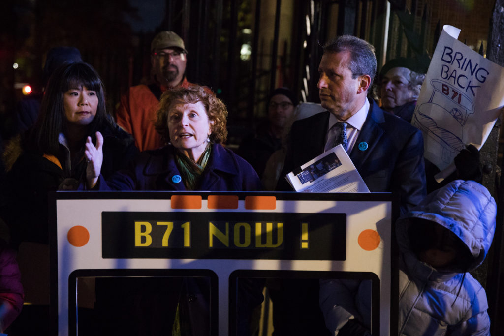 Local residents gathered outside the Park Slope Library to demand the MTA bring back the B71 bus route. Assemblymember Jo Anne Simon has been fighting for its return since 2010. Eagle photo by Paul Frangipane