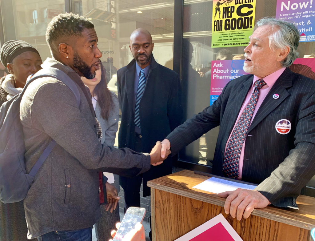 Public Advocate Jumaane Williams shook the hand of Housing Works CEO Charles King in Downtown Brooklyn on Monday after a confrontation over Housing Works employees’ efforts to unionize. Eagle photo by Mary Frost