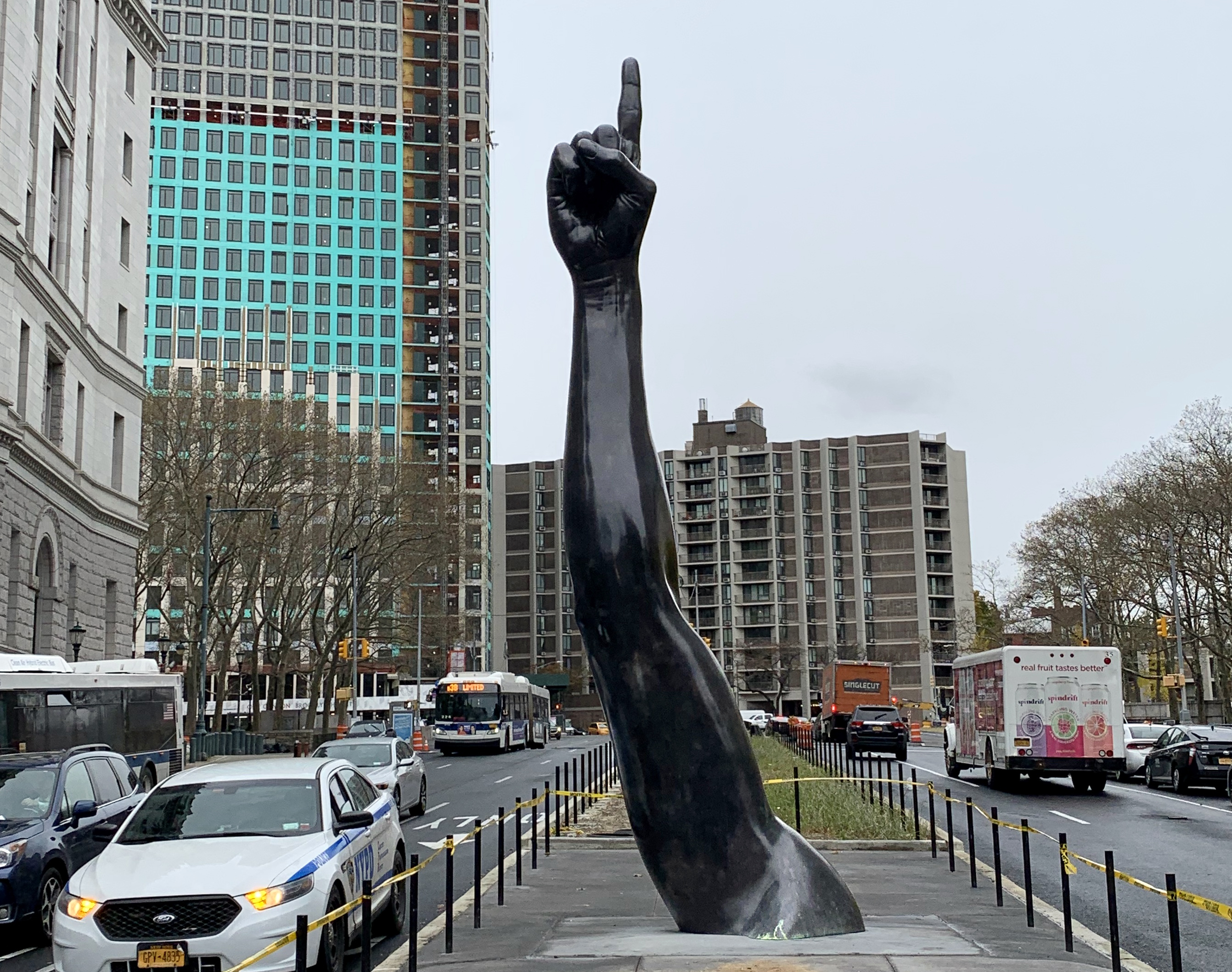 ‘Unity’ by Hank Willis Thomas, installed last week at Tillary and Adams streets in Downtown Brooklyn, has been generating a lot of comments. Some of them are pretty surprising. Eagle photo by Mary Frost