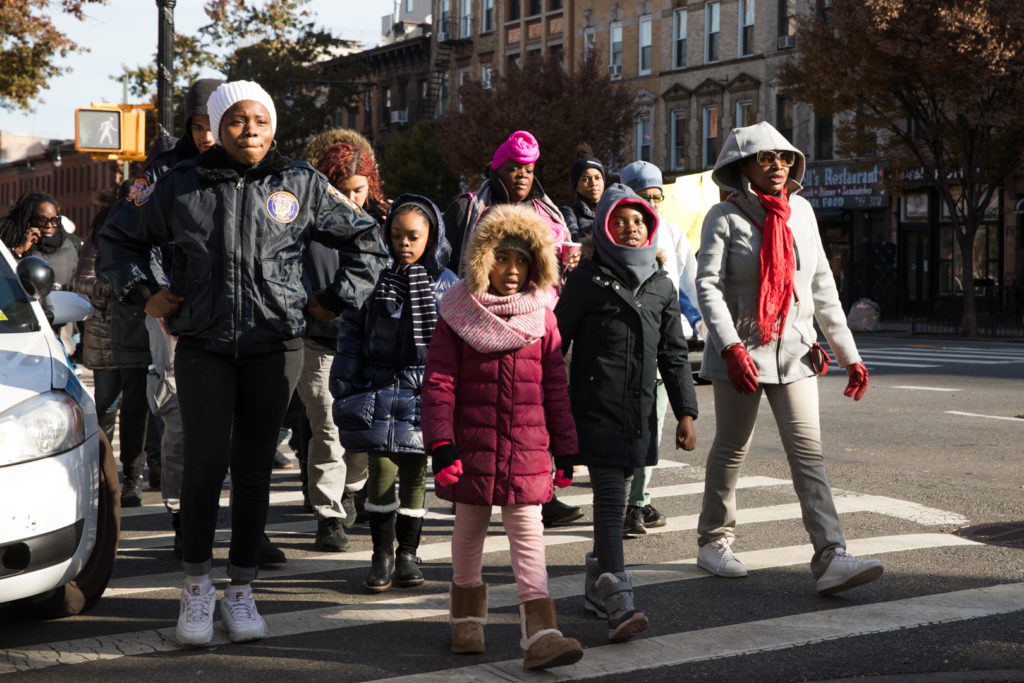 Dozens of schoolchildren, alongside Congresswoman Yvette Clarke, marched through the streets of Brooklyn to stand in solidarity with migrant children separated from their families at the southern border. Eagle photo by Paul Frangipane