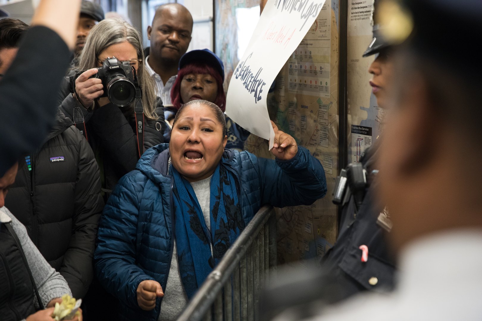 Maria Marin, a tamale vendor, yells to police of the 33rd Transit District.