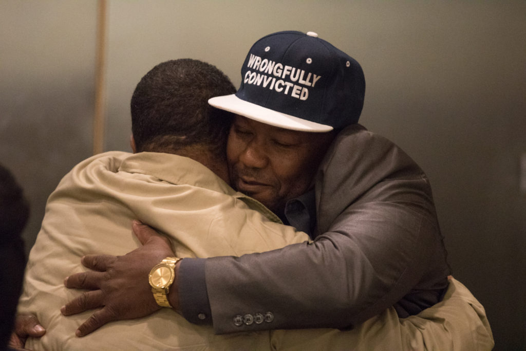 Derrick Hamilton, a victim of Louis Scarcella, hugs Eliseo DeLeon as DeLeon is released at Brooklyn Supreme Court. Photo: Paul Frangipane/Brooklyn Eagle