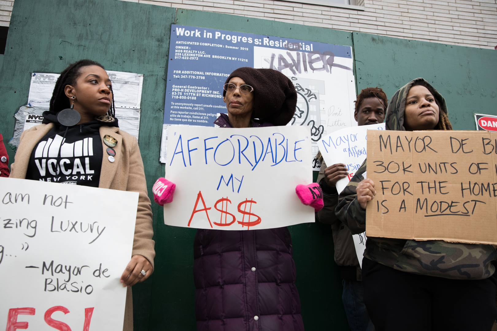 Housing advocates gathered outside 348 Nostrand Ave. to demand the city offer truly affordable housing and units for homeless New Yorkers. Photo: Paul Frangipane/Brooklyn Eagle