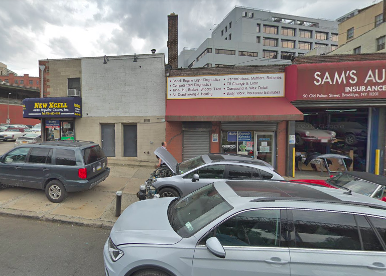The owner of 50 Old Fulton St., currently the site of a popular auto body shop next to the BQE, wants to rezone the property and 60 Old Fulton St. next door in order to develop a commercial six-story building. Image: © Google Maps 2019