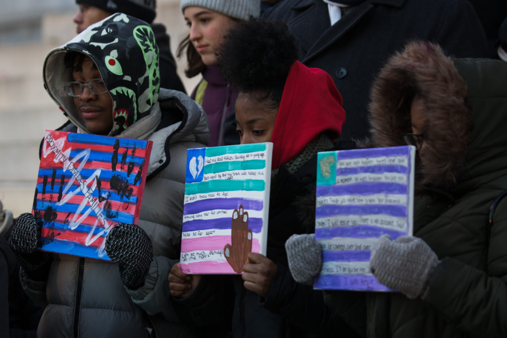 Children of incarcerated parents rallied on the steps of Borough Hall to call for passage of three bills that advocates say would make it easier for families to visit their loved ones in upstate prisons. Photo: Paul Frangipane/Brooklyn Eagle