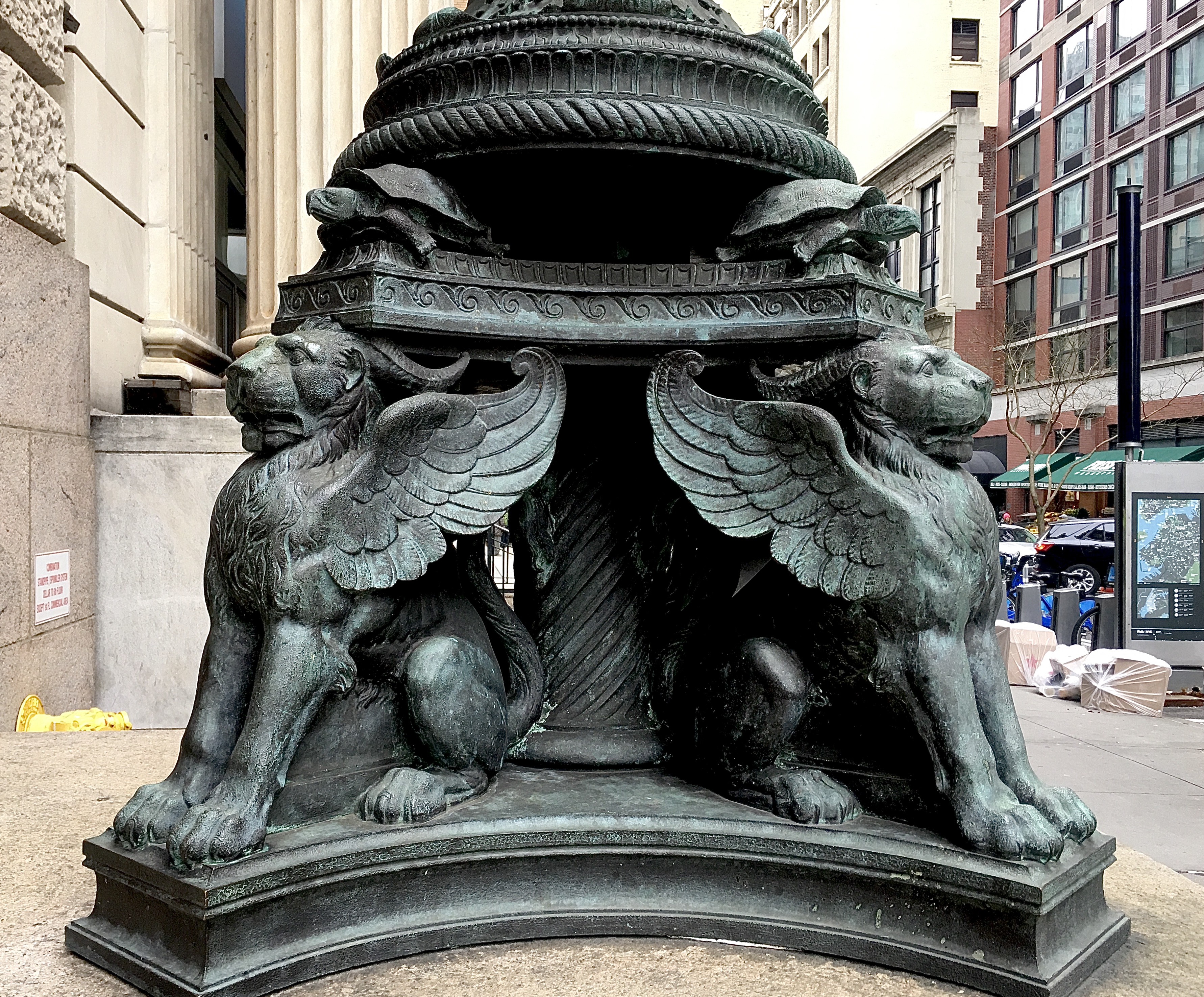 Hello Kitties: Winged lions form the base of a lamppost at Montague Street’s Chase Bank branch. Photo: Lore Croghan/Brooklyn Eagle