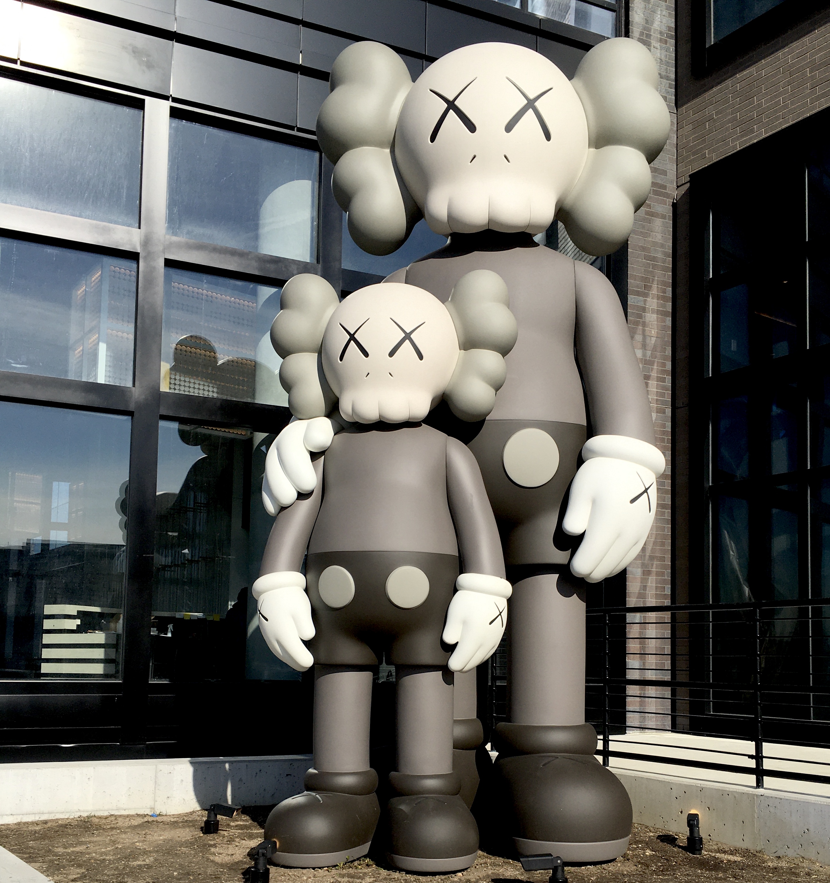 An artist named KAWS designed this sculpture, which is called “Waiting.” Photo: Lore Croghan/Brooklyn Eagle