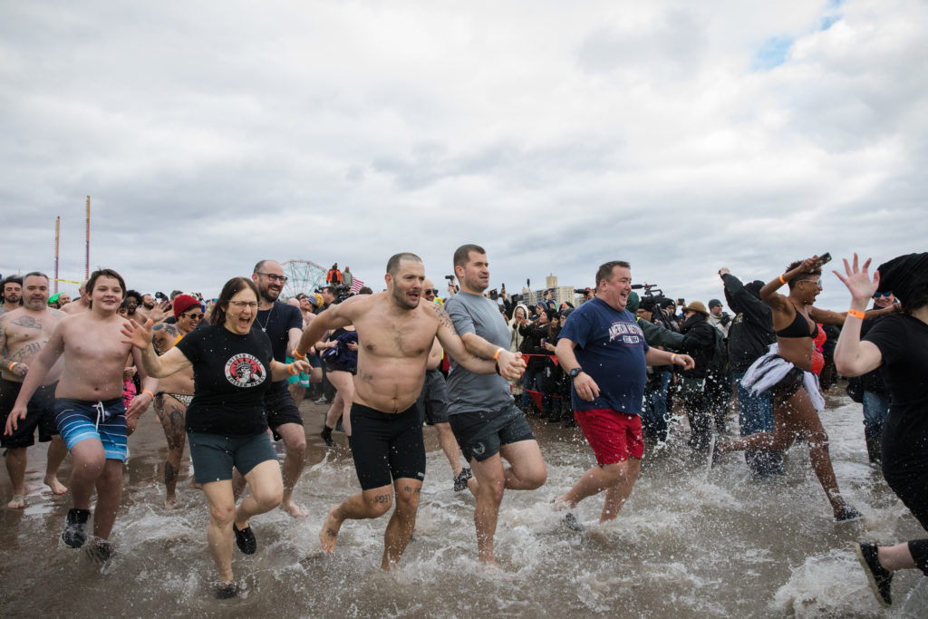 Thousands of people took to the wintry waters of Coney Island on Jan. 1 to ring in the new year. Photo: Paul Frangipane/Brooklyn Eagle