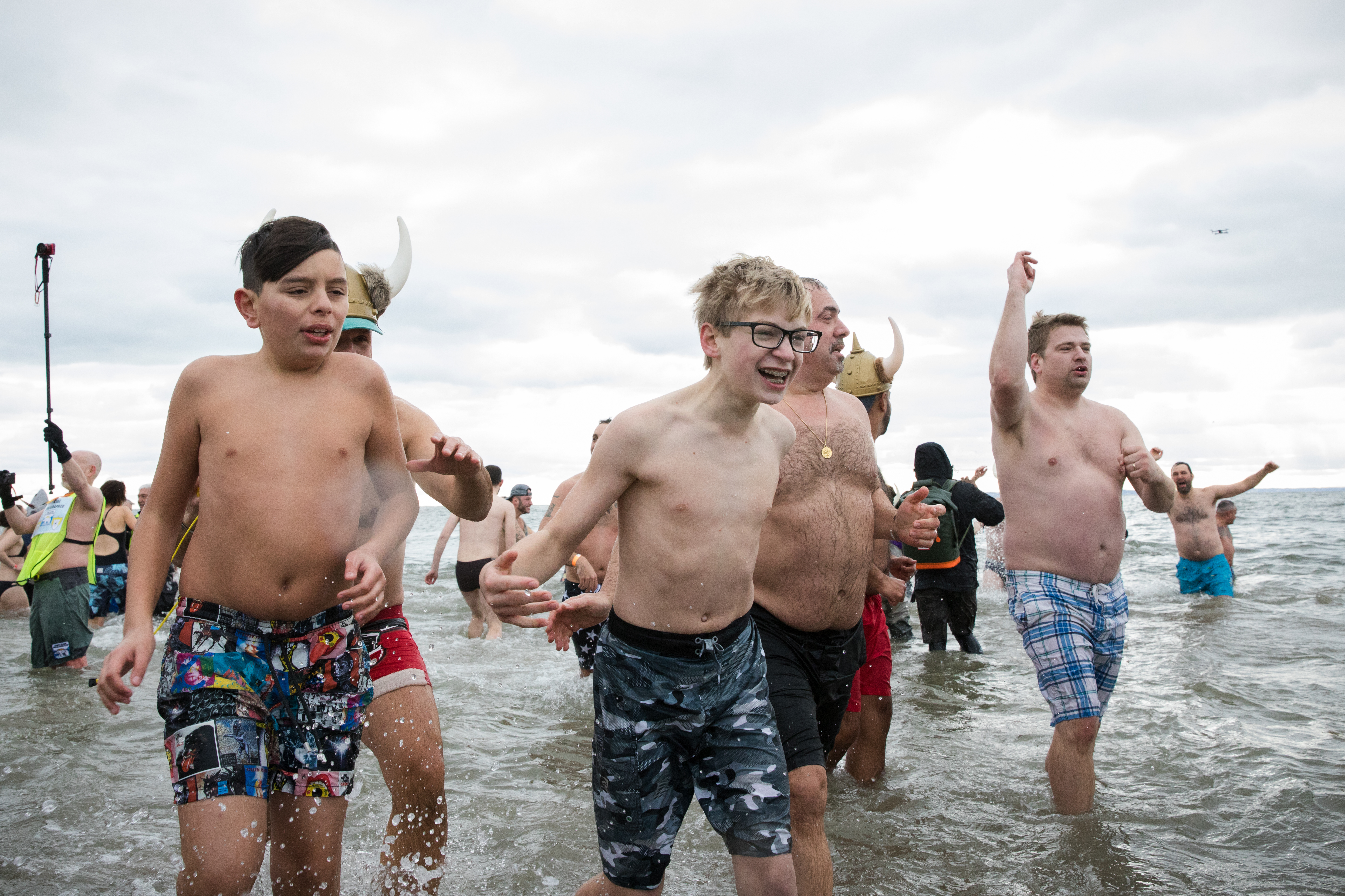 Swimmers of all ages plunged into the frigid water.