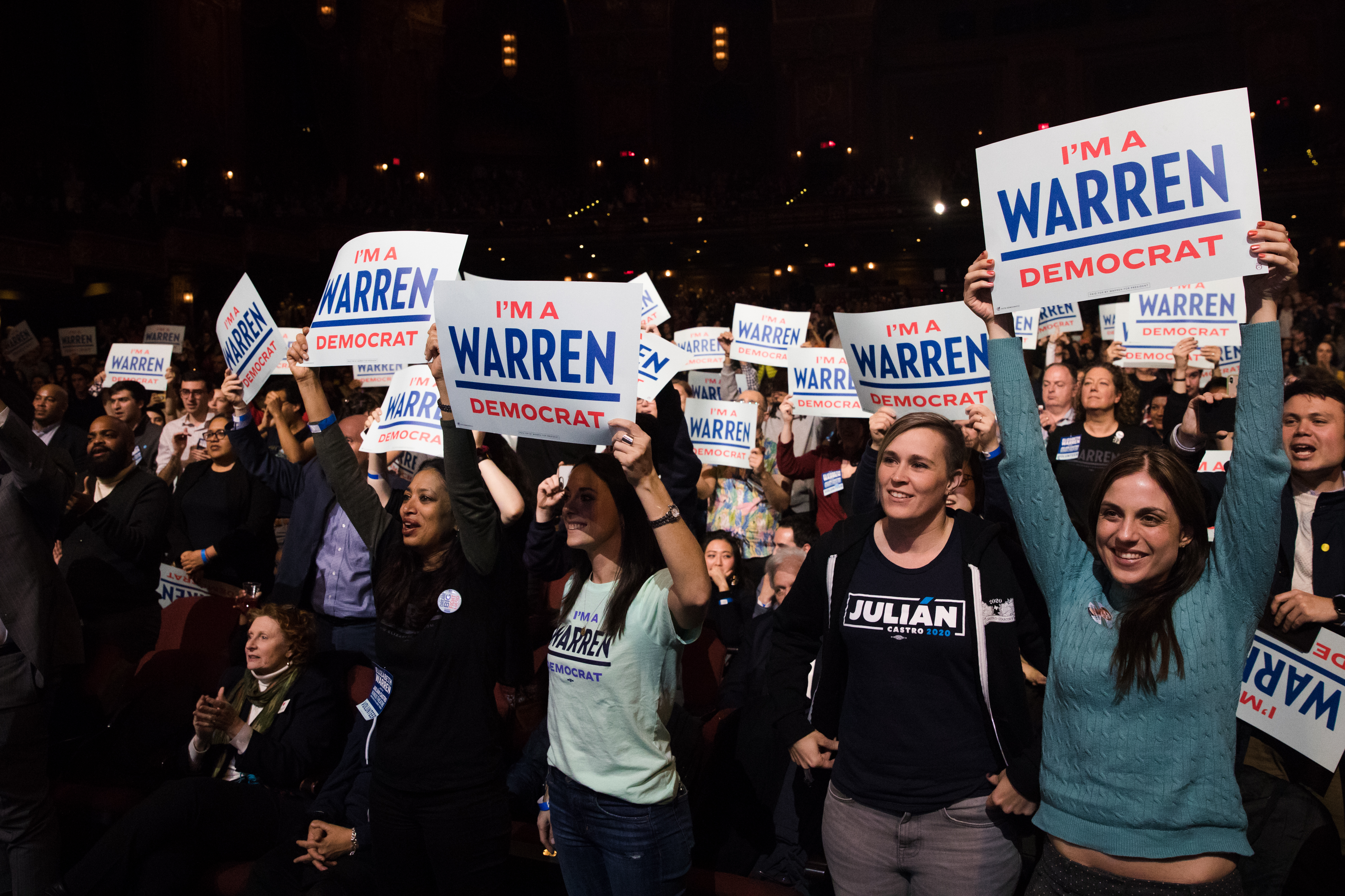 The crowd repeatedly jumped out of their chairs to cheer along during Warren's speech.