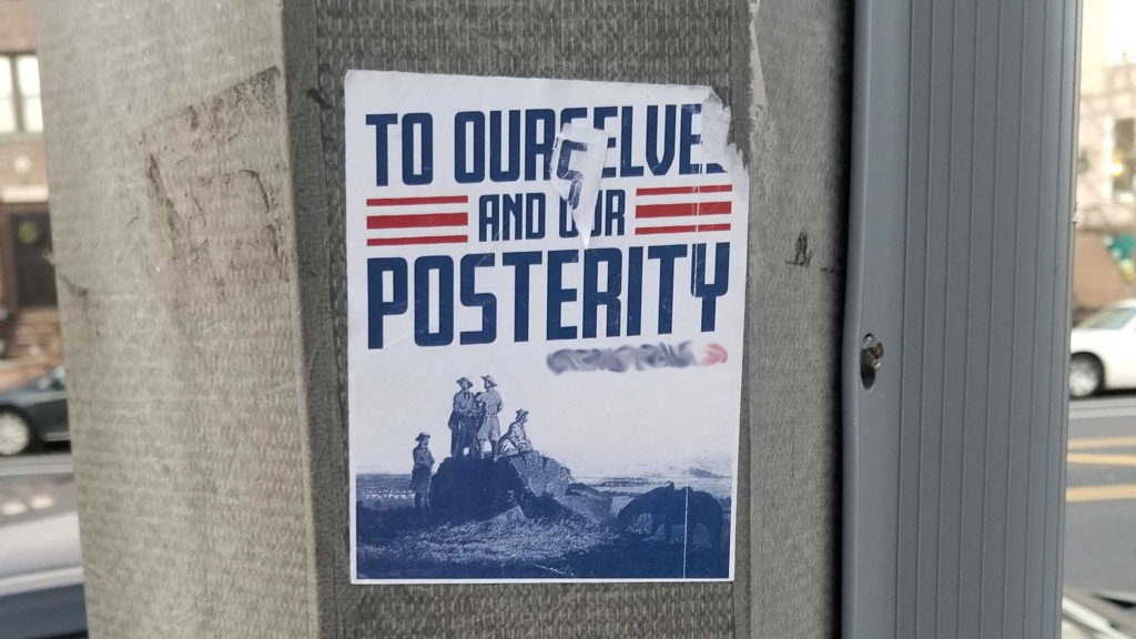 Posters for the white nationalist group began appearing around the New Year. Photo: Noah Abraham Weston/Twitter