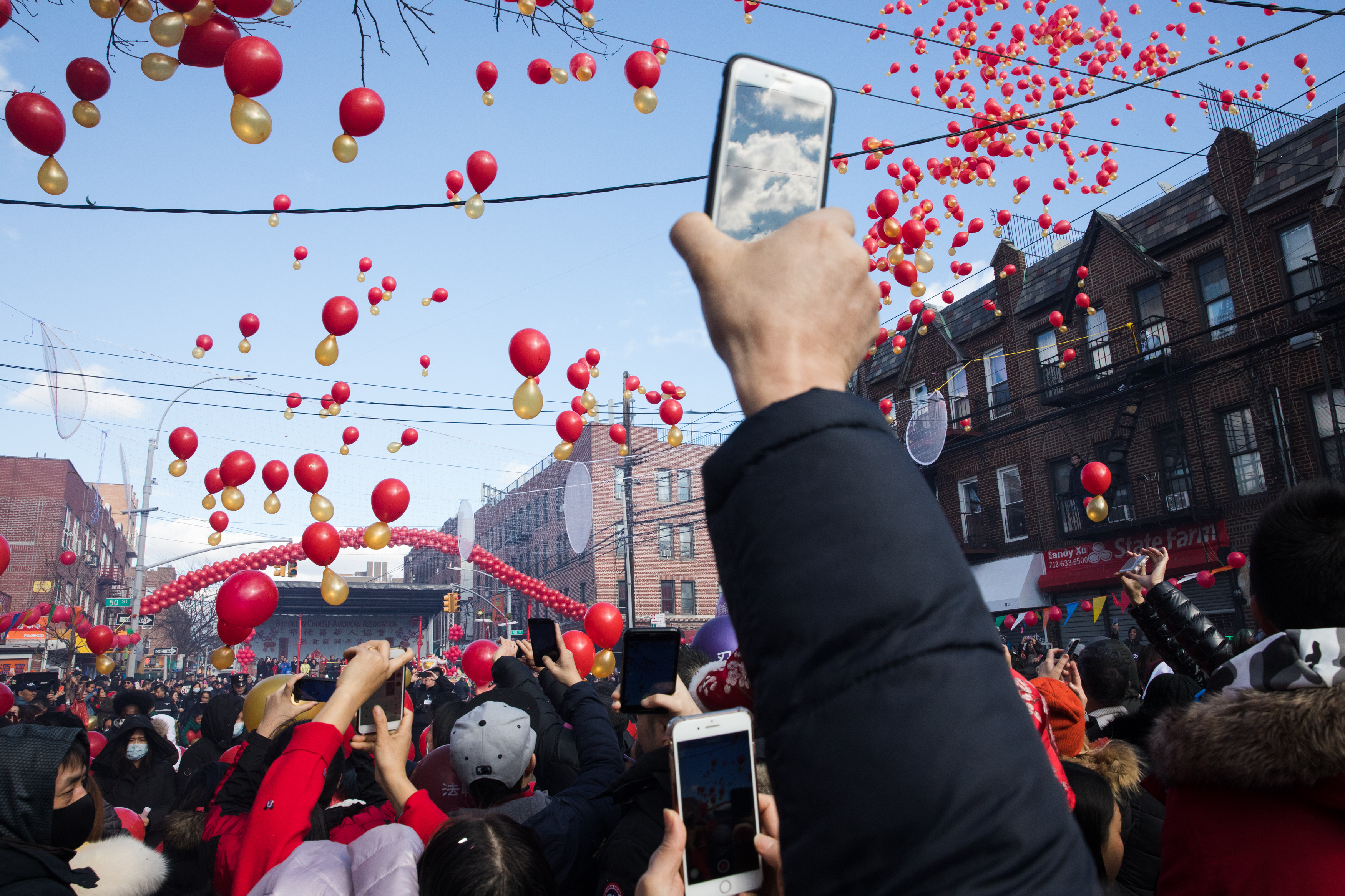 Hundreds of balloons were dropped onto the crowd on 8th Avenue before the parade kicked off.