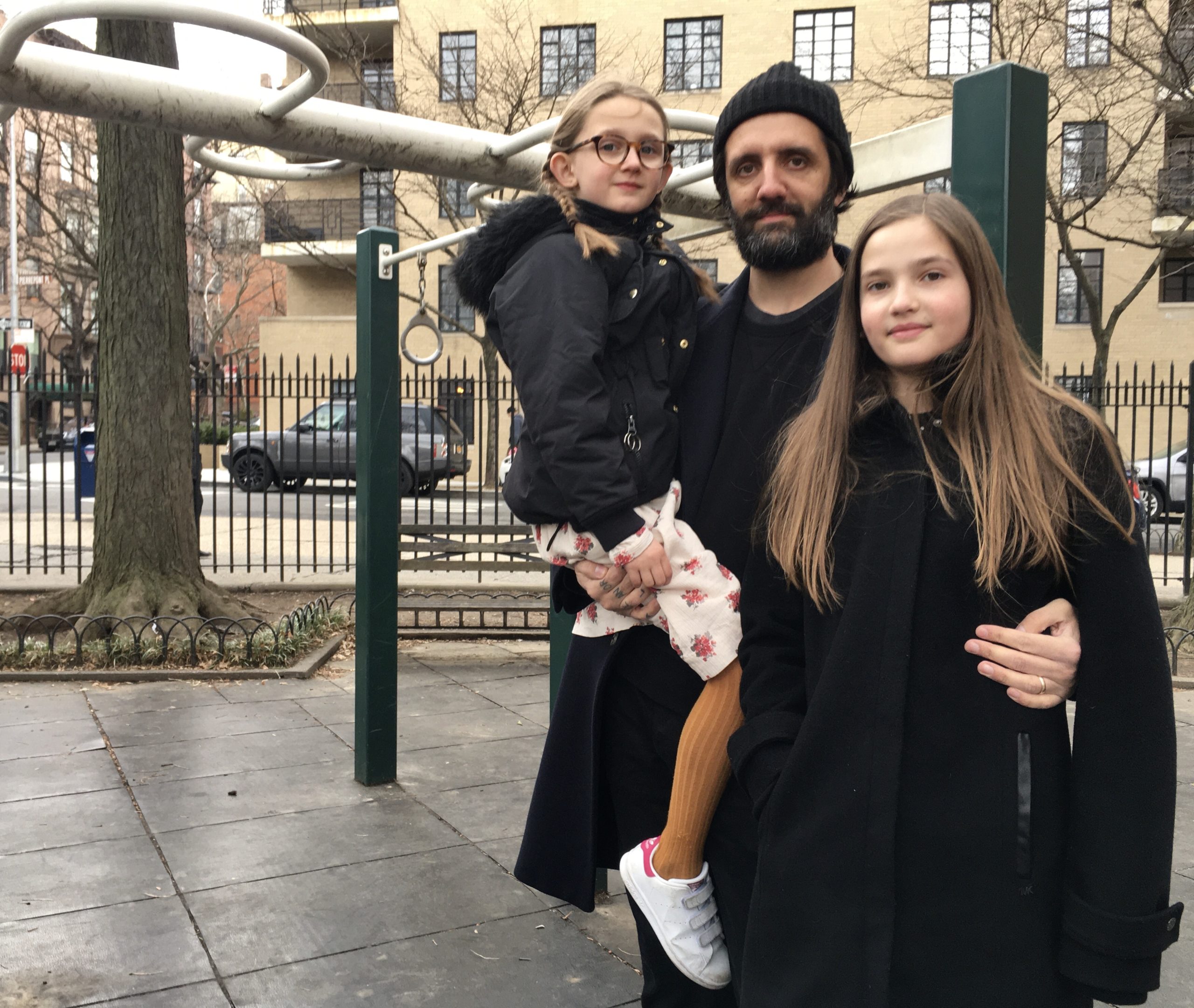 Sacha Maric, with daughters Alma (at left) and Eleanor (at right), is glad the Promenade won’t be torn down. Photo: Lore Croghan/Brooklyn Eagle