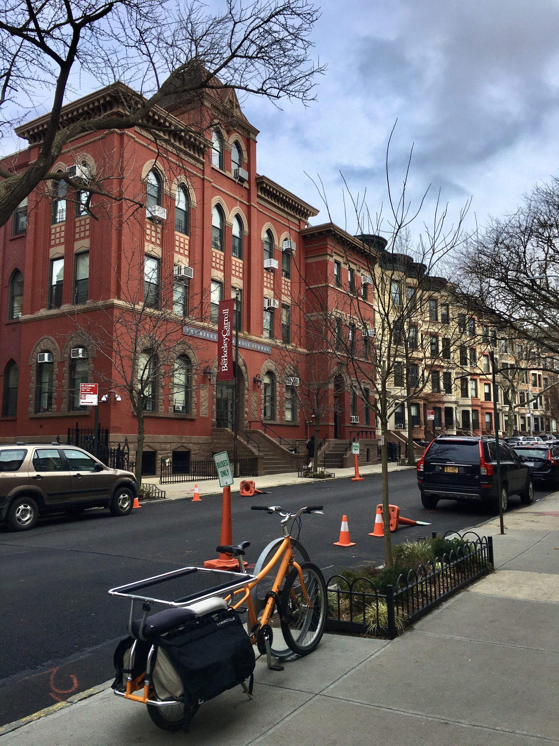 A row of residential buildings stands on Carroll Street beside an old-fashioned Berkeley Carroll School building. Photo: Lore Croghan/Brooklyn Eagle