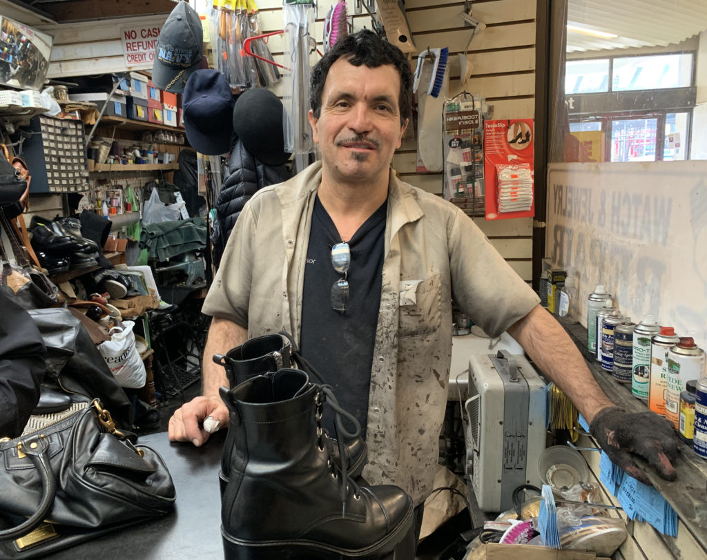 Fernando Costano, a long-time employee at Brooklyn Heights Shoe Master in the Clark Street Station arcade, says closing the station for eight months could put the shop out of business. Photo: Mary Frost, Brooklyn Eagle