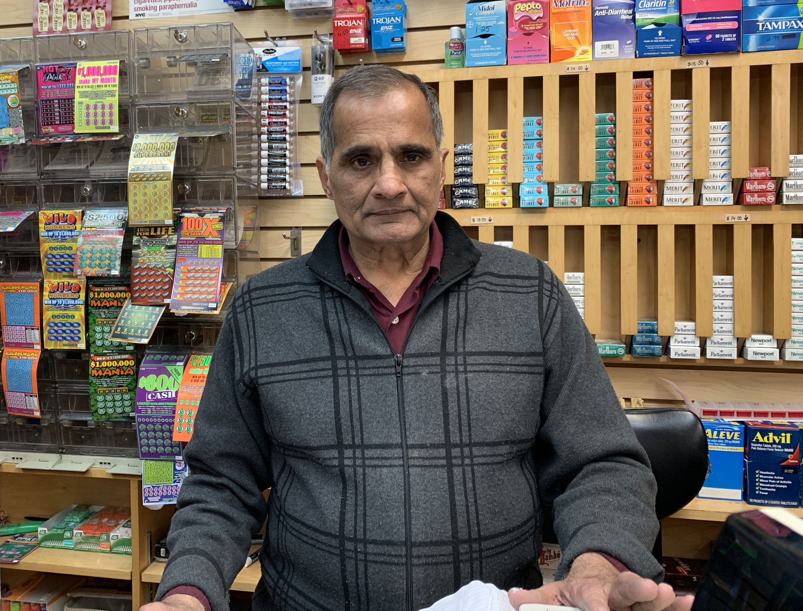 Salahuddin Aziz, owner of the newsstand at Clark Street Station. Photo: Mary Frost, Brooklyn Eagle
