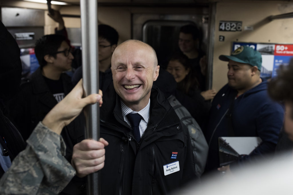 NYC Transit President Andy Byford smiles as transit enthusiasts pour compliments over him while riding an R-42 subway car. The 1969 cars were on their final ride on Feb. 12, 2020 before their retirement. Photo: Paul Frangipane/Brooklyn Eagle