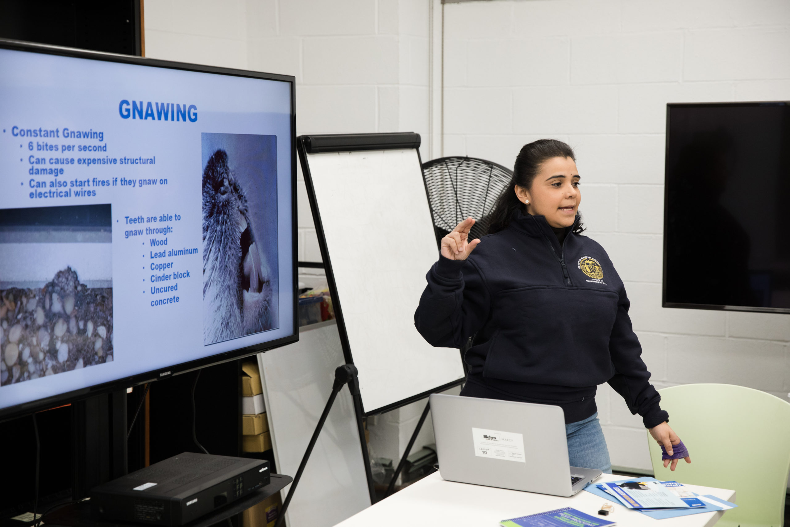 Community Coordinator Martha Morales of the New York City Department of Health and Mental Hygiene holds a community rat prevention training, or rat academy at the Marcy Branch of Brooklyn Public Library. Photo: Paul Frangipane/Brooklyn Eagle