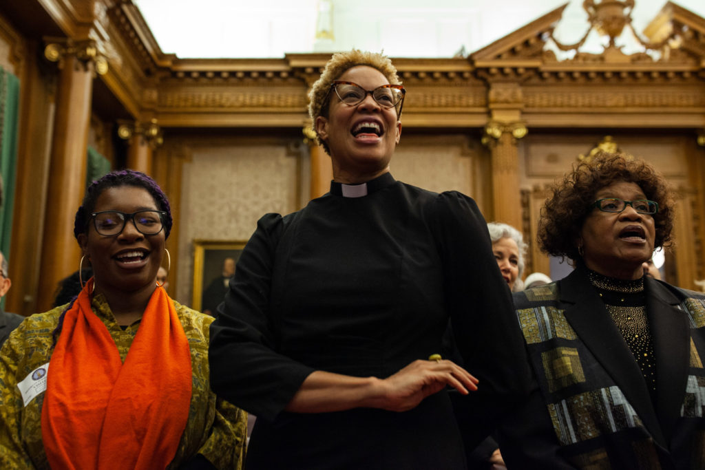 Members of local Brooklyn clergy sing "Lift Every Voice and Sing" at a celebration of Black History Month at Brooklyn Borough Hall on Feb. 27, 2020. Photo: Paul Frangipane/Brooklyn Eagle