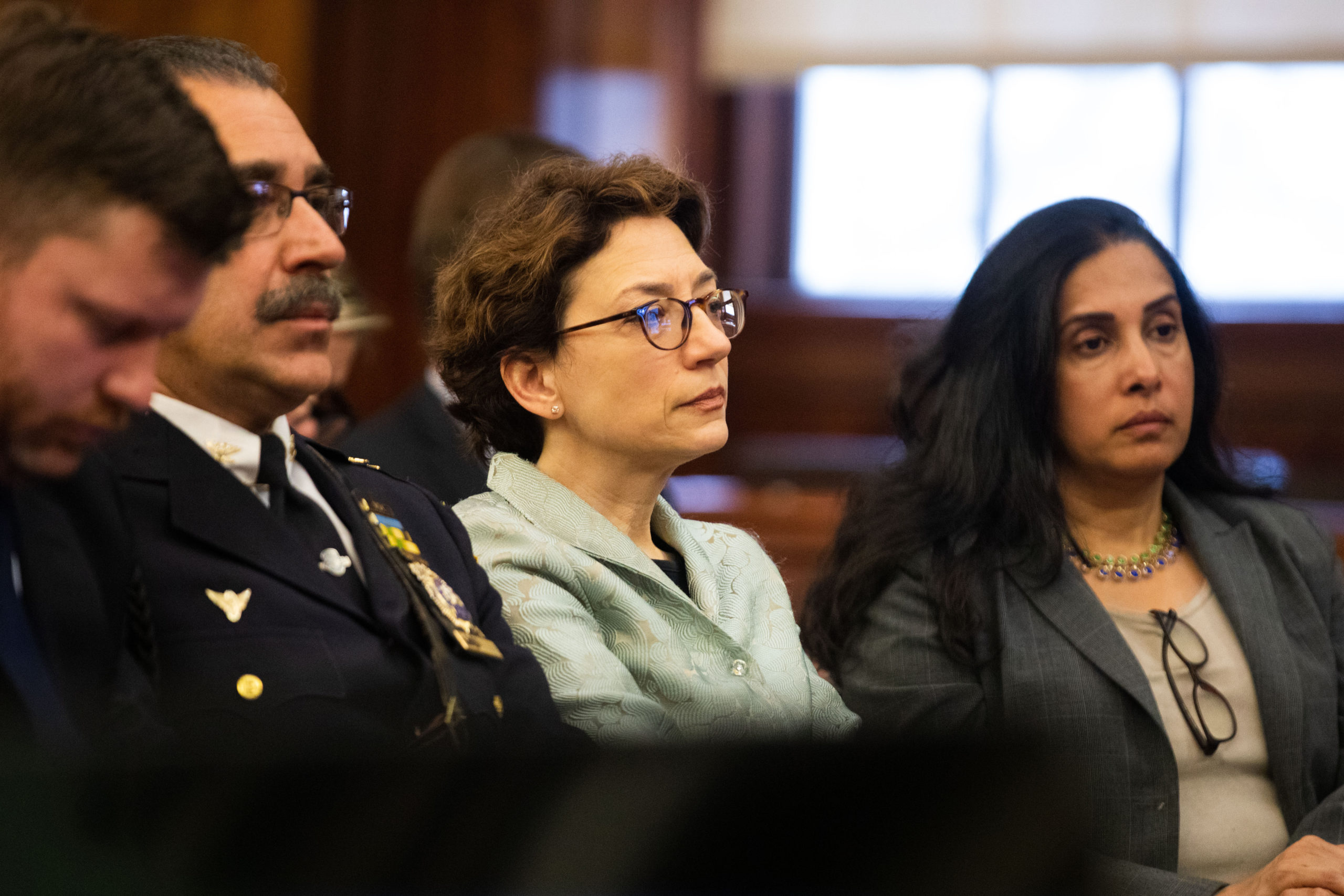 NYC Department of Transportation Commissioner Polly Trottenberg sits in the crowd during a City Council hearing to discuss the future of the Brooklyn-Queens Expressway on Feb. 25, 2020. The aging highway was thrust into controversy in September 2018 when DOT backed replacing the Brooklyn Heights Promenade with a six-lane highway to speed up the expressway repairs. Photo: Paul Frangipane/Brooklyn Eagle