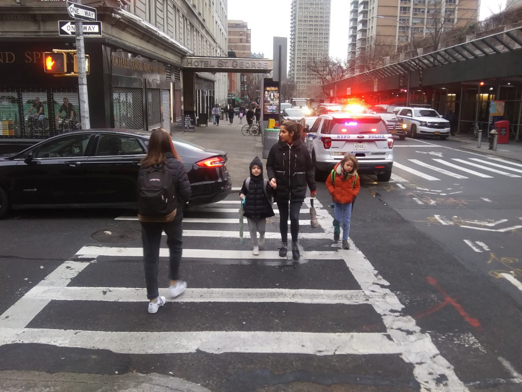 People walked to work and school just up the block from Tuesday morning’s stabbing on Clark Street. Photo: William Balardelle/Brooklyn Eagle