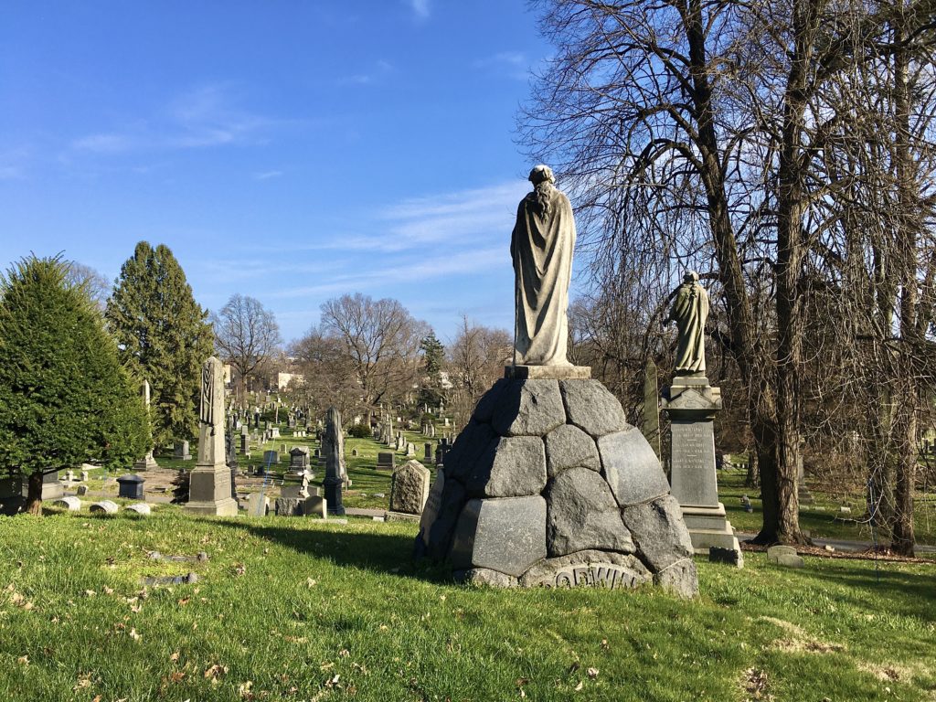 The statue and stone mounds in the center of this picture are John Davis Godwin’s grave monument. Photo: Lore Croghan/Brooklyn Eagle