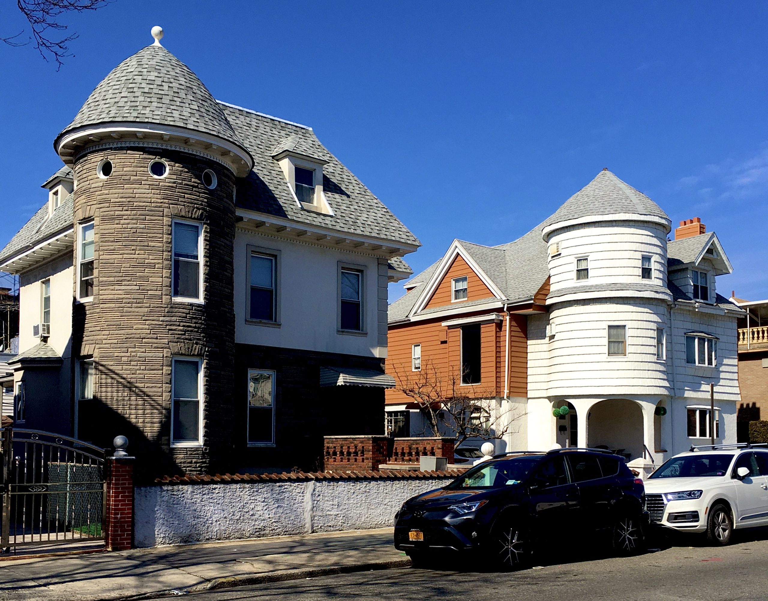 These similarly shaped Victorian houses are 8732 (at left) and 8730 20th Ave. in Bath Beach. Photo: Lore Croghan/Brooklyn Eagle